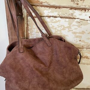 Beautiful free people bag comes with an extra strap wallet